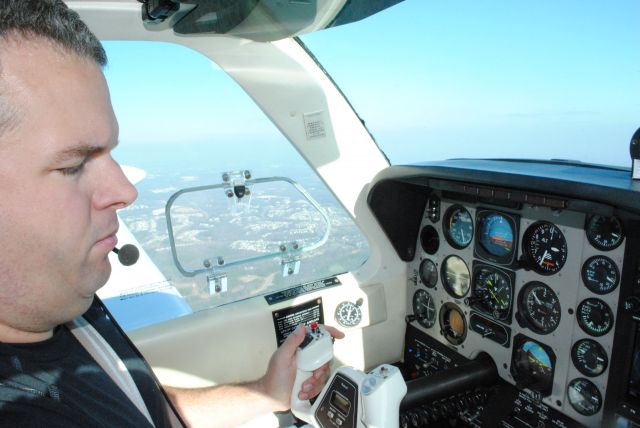 Beechcraft Bonanza (36) (N1116A) - Just after departure from KUZA.  Pilot TJ Maher.