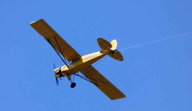 Piper L-21 Super Cub (N8519Y) - Making a low pass is this 1970 Piper Super Cub PA-18-150 Tow Plane in the Summer of 2019.