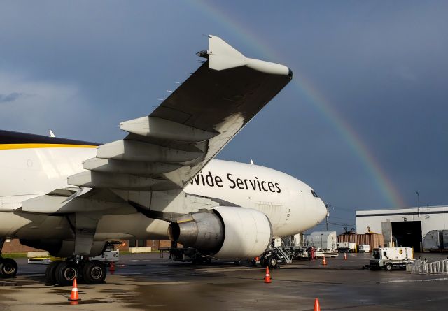 Airbus A300F4-600 (N165UP) - A rainbow appearing after hours of rain