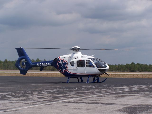 Eurocopter EC-635 (N253AM) - 3/6/09. AirHeart helicopter landing at an LZ set up at KCEW.