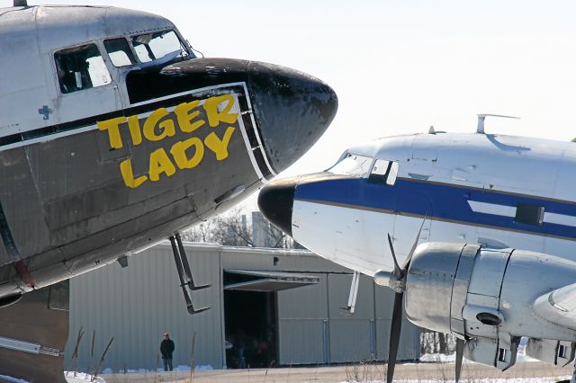 — — - DC-3 from Miami Valley Aviation and Tiger Lady DC-3 at Basler Aviation Oshkosh, WI