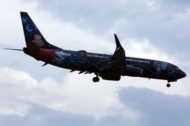 Boeing 737-800 (C-GWSZ) - WestJet B738 in special 'Walt Disney World - Mickey Mouse Livery' arriving to BOS from Calgary on 8/9/22.