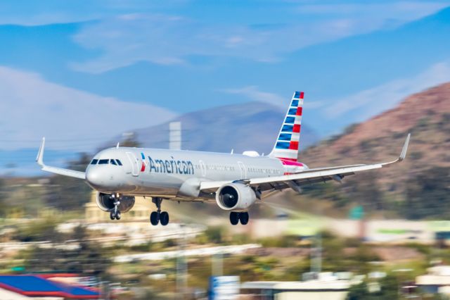 Airbus A321neo — - An American Airlines A321 neo landing at PHX on 2/28/23. Taken with a Canon R7 and Canon EF 100-400 L ii lens.