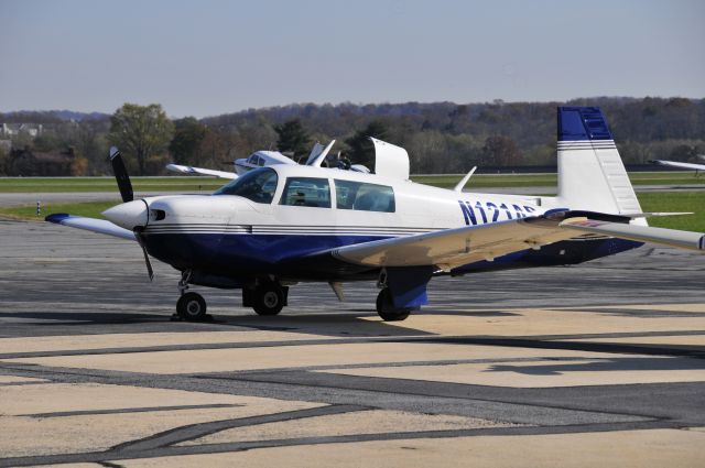 Mooney M-20 (N121AS) - Seen at KFDK on 11/7/2009.  This was a gathering & transfer point for pilots rescuing animals from South Carolina to various points in the northeast.  Most of these animals were within days of being euthanized at a kill-shelter. Its a wonderful organization that saves the lives of countless dogs & cats.  http://www.animalrescueflights.org/    a href=http://discussions.flightaware.com/profile.php?mode=viewprofile&u=269247  [ concord977 profile ]/a