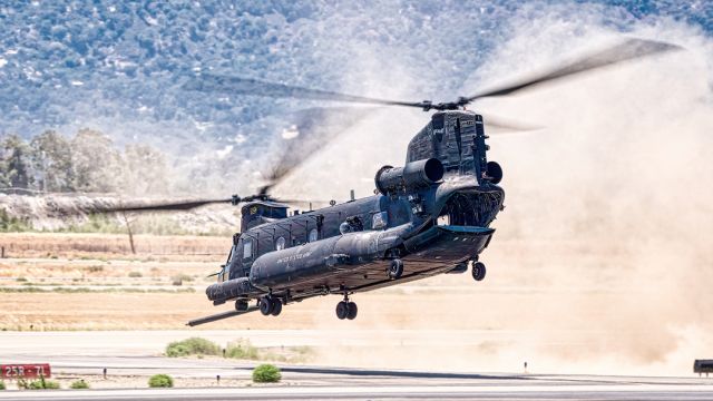 Boeing CH-47 Chinook (0703774) - Boeing MH-47G Chinook from US Army 160th Special Operations Aviation Regiment makes a dusty departure from Livermore Municipal Airport June 2022.