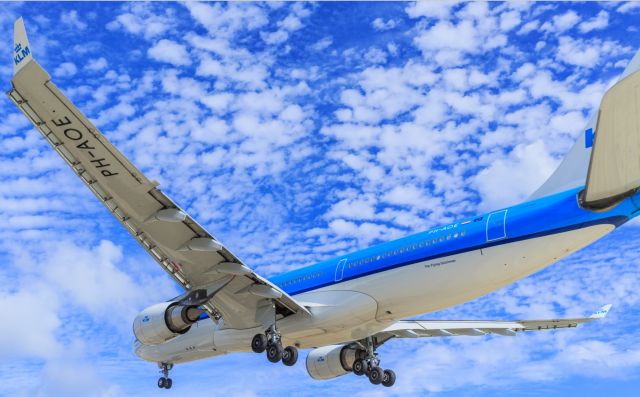 Airbus A330-200 (PH-AOE) - KLM PH-AOE landing at TNCM St Maarten with some friendly skys!! 