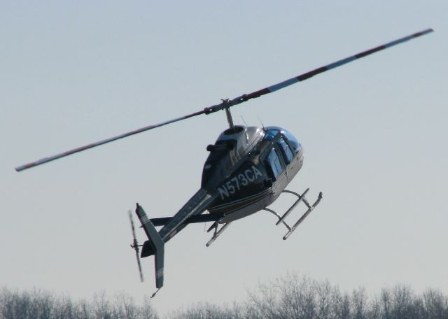 Bell JetRanger (N573CA) - Not sure if this was an autorotation or not. This Bell 206 would come down, stand on its tail, and slide a good ways on the runway. I guess practice makes perfect!