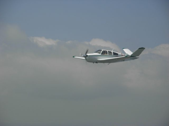 Beechcraft 35 Bonanza (N9431S) - Photo by Chester Jurskis. June 14, 2008 over Lake Lewisville north of Dallas TX.