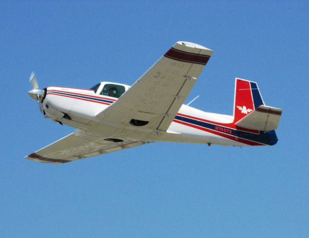 Mooney M-20 (N74573) - Taking off from RWY 24