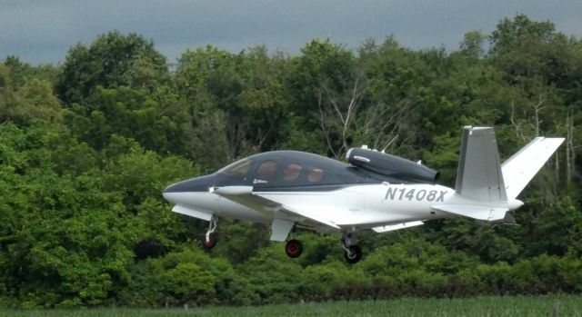 Cirrus Vision SF50 (N1408X) - Shortly after departure is this 2018 Cirrus Vision Jet SF50 in the Summer of 2021.