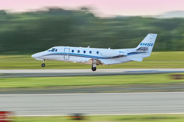 Cessna Citation Excel/XLS (N343CC) - As the sun was setting at Atlanta's PDK airport the lighting was really bringing out some great colors. I had my camera and lens on a monopod and really cranked the shutter speed down. I think I really nailed the clarity of this Jet Linx Citation Excel. I shot this with my Canon 300mm lens. Shutter was 1/100, F8, ISO 640. Please check out my other aviation photography. Votes and positive comments are always appreciated. Questions about this photo can be sent to Info@FlewShots.com