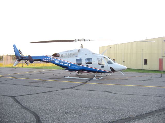 Bell 222 (N222AM) - On the ramp at KHIB when it was Life Link III. Photo Taken 7/6/09.