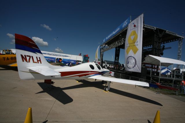 Lancair Evolution (N7LH) - To see more photos from the 2013 EAA Airventure, click here- a rel=nofollow href=http://www.facebook.com/media/set/?set=a.10153121083865078.1073741840.283142505077&type=1&l=dc84cd9463https://www.facebook.com/media/set/?set=a.10153121083865078.1073741840.283142505077&type=1&l=dc84cd9463/a