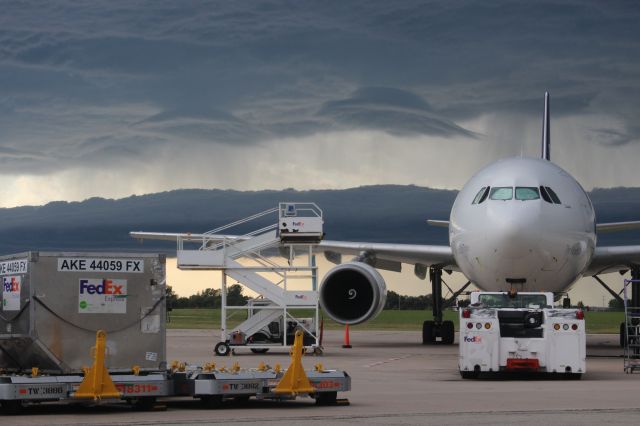 Airbus A300F4-600 (N676FE) - Storm clouds approaching at the dinner hour.......flying saucer shaped lenticular clouds. 