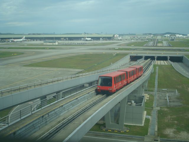 — — - TAKEN FROM THE KLIA VIEWING GALLERY. AEROTRAIN.