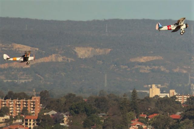 OGMA Tiger Moth (VH-NOV) - Boeing model E75  VH-YND and Tiger Moth A17-757 VH-NOV over South Perth, Western Australia 17-10-2015, late afternoon Sun.