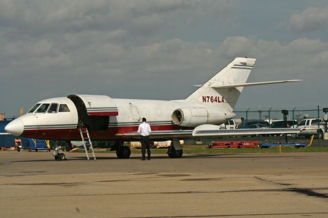Dassault Falcon 20 (N764LA) - Found this Dassault Falcon 20EW in my archives. I caught it on the cargo ramp on 3 Apr 2006. This aircraft has changed owners and registrations several times since first delivered in 1970. It is still operating today (8 Jan 2022) as N120RA.