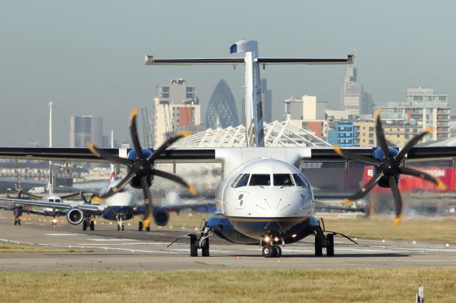 — — - Blue Island ATR-42, taxies down the runway at London City Airport.