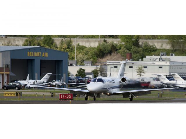 Cessna Citation CJ3 (N971TB) - Reliant's CJ2 landing runway 26. Ground flaps deployed.