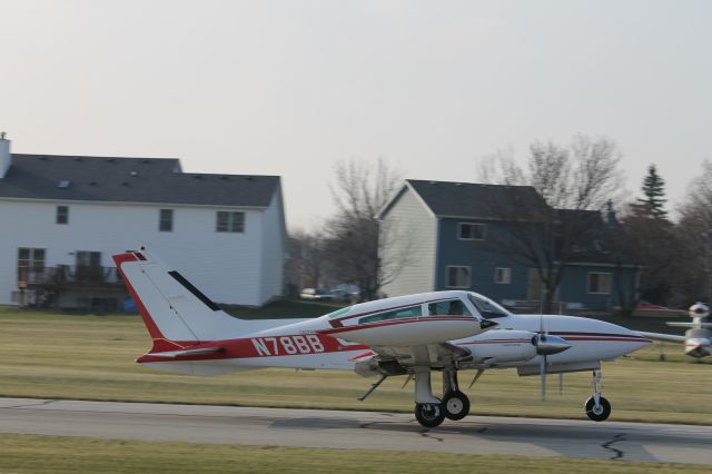 Cessna 310 (N78BB) - Taking off runway 36 at 1C5