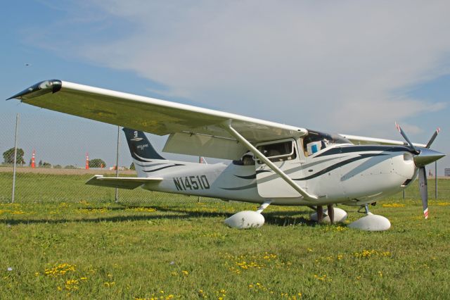 Cessna Skylane (N14510) - Parked in the North 40, getting ready for the flight back to Winchester after a great week in Oshkosh!