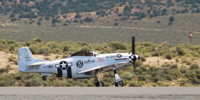 PAPA 51 Thunder Mustang (N151CR) - Plenty of action on the first day of the 2019 Pylon Racing Seminar at Reno Stead Airport in preparation for the 2019 National Championship Air Races just three months from now. In this click, "Clas Thunder One," a Thunder Mustang, is going airborne as the second of a group of Sport Class aircraft that are about to circle the course to become familiar with the location of the pylons and the route of the Sport Class Course. One of the outer pylons is visible in the distance. 