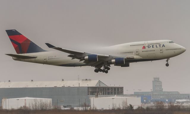 Boeing 747-400 (N674US) - My last chance to capture a Delta 747. Drove 4 hours to Detroit in appalling weather but Im glad we did!