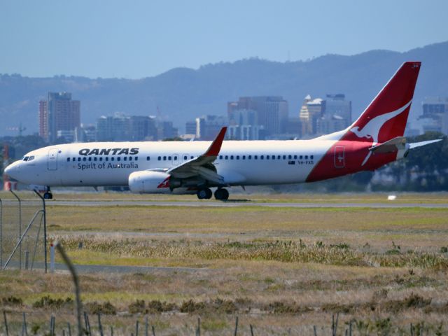 Boeing 737-800 (VH-VXG) - On taxi-way heading for Terminal One, after landing on runway 23. Thursday 12th April 2012.