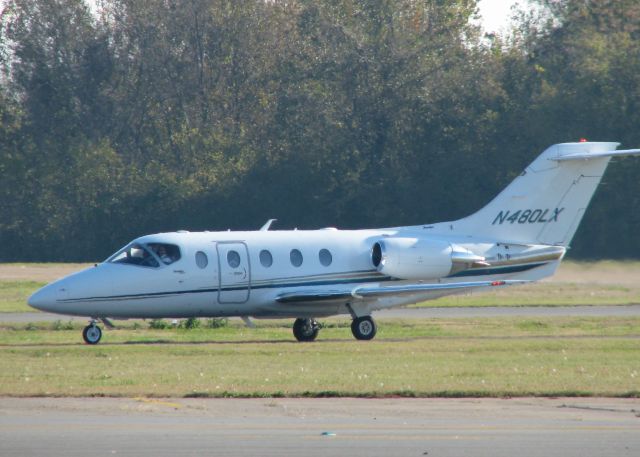 Beechcraft Beechjet (N480LX) - Heading to the terminal after landing on 14 at Downtown Shreveport.