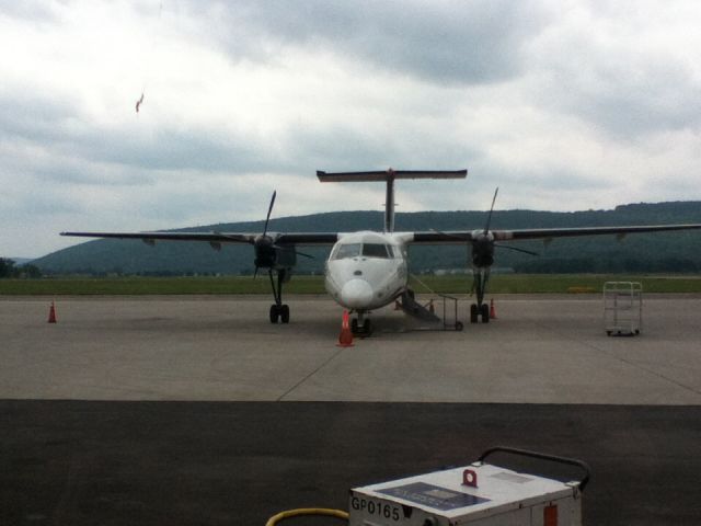 de Havilland Dash 8-200 — - Piedmont DBA US Airways Express Dash -8 200 on the ground at KELM. Picture taken with iPod touch.