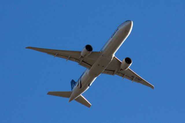 BOEING 777-300ER (HL7783) - Korean Air B777-300 in Sky Team colors departing BOS on 12/17/21.