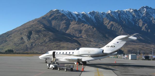 Cessna Citation X (VH-RCA) - A gorgeous Cessna Citation X photgraphed from the roof of the Queenstown International Airport roof whilst working on a fine winters day in July 2010. The world famous Remarkables Mountain range features prominently in the background!