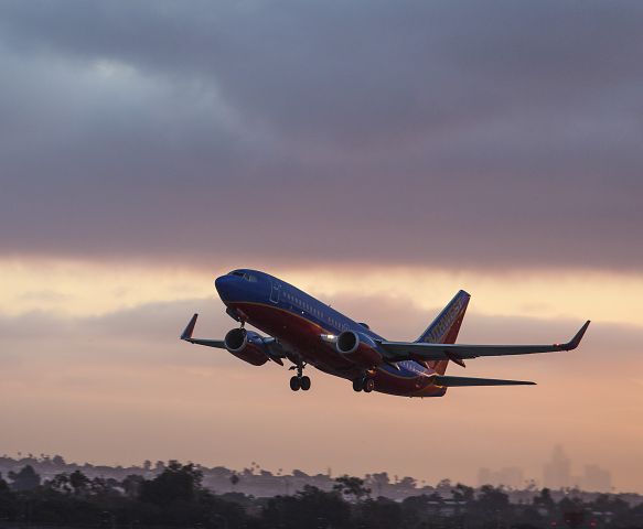 Boeing 737-700 (N203WN) - Pre-dawn takeoff from runway 24R, Los Angeles (LAX), California USA