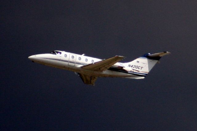 Beechcraft Beechjet (N420CT) - Airborne off R36C heading for KIND on 02-Aug-10.