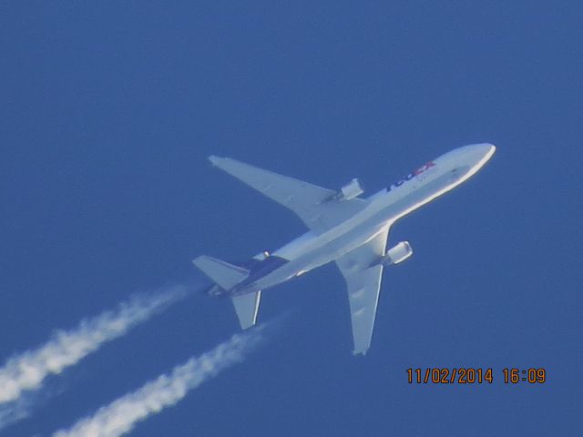 Boeing MD-11 (N523FE) - FedEx flight 582 from MEM to PDX over Baxter Springs Kansas (78KS) at 38,000 feet.