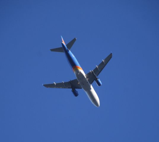 Airbus A320 (N233NV) - Taken on approach to GSP from Simpsonville, South Carolina.