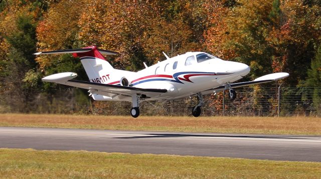 Eclipse 500 (N61DT) - An Eclipse EA500 departing Word Field, Scottsboro Municipal Airport, AL in bright sunlight - October 17, 2022. 