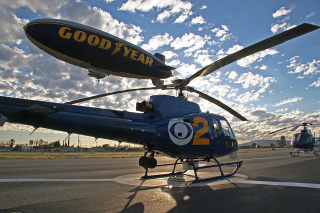 N492TV — - Flyby of Goodyear Blimp at Whiteman Air Park, Pacomia, CA. KCBS Chopper 2 and KCAL Sky 9 on the ramp at the ready