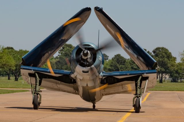 Experimental  (N92879) - SB2C-5 Helldiver aircraft with wings folded after landing at Houston Executive Airport in April 2019. This is the only flying example of this aircraft type in the world.