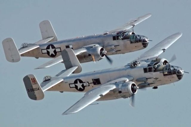 North American TB-25 Mitchell (N9856C) - North American B-25J Mitchells Pacific Princess N9856C and Photo Fanny N3675G at Chino on October 6, 2001.