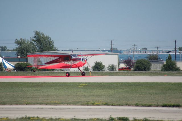 Cessna 120 (N1829V) - Silver taildragger land on the pink dot.