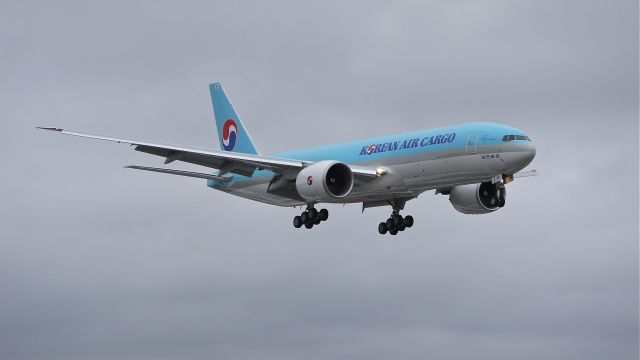 BOEING 777-200LR (HL8251) - BOE136 on final approach to runway 16R after receiving its paint at KPDX. Photographed 1/21/12.