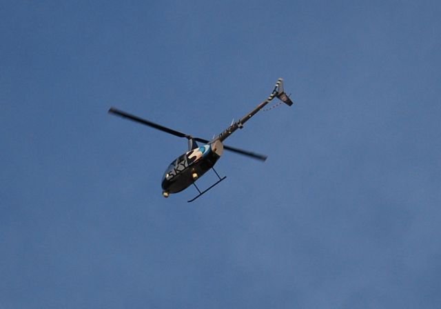 Robinson R-44 (N7094J) - CBS affiliate WBTVs news chopper, SKY 3, circling the new BB&T Ballpark in downtown Charlotte, NC during Opening Night ceremonies between the Charlotte Knights and Norfolk Tides. - 4/11/14