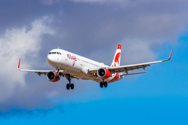 Airbus A321 (C-FJOU) - An Air Canada Rouge A321 landing at PHX on 2/26/23. Taken with a Canon R7 and Tamron 70-200 G2 lens.