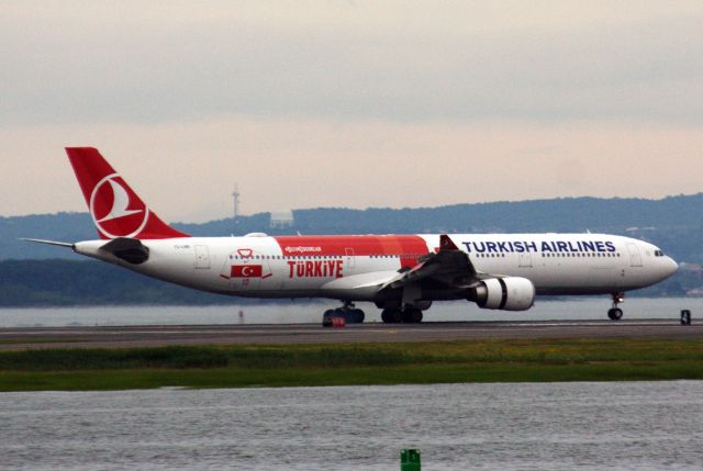 Airbus A330-300 (TC-LND) - Turkish A330-303 (TC-LND) arriving to Boston Logan tonight from Istanbul wearing the new special 'Turkish National Team' livery.