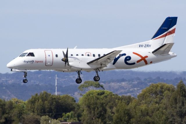 Saab 340 (VH-ZRH) - About to put down on runway 05. Friday 19th April 2013.