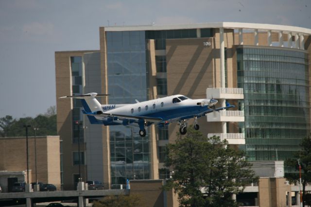 Piper Malibu Mirage (N656AF) - Take off with the CDC in the background