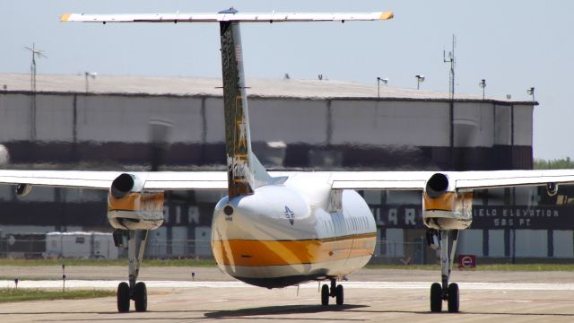 de Havilland Dash 8-300 (1701609) - “Golden Knights (GKA) 609” br /br /The US Army Parachute Team, aka the Golden Knights, taxiing to 23 in their De Havilland Canada C-147A after a quick fuel stop, enroute to Offutt AFB. 5/5/23