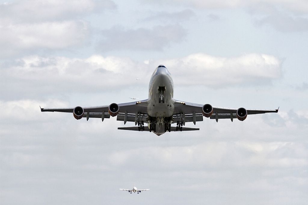 Boeing 747-400 (G-VROY) - [cn.32340/1277]. 'Pretty Women' on climb-out from runway 26L at Gatwick EGKK Airport with two aircraft on the approach 12.5.2013.