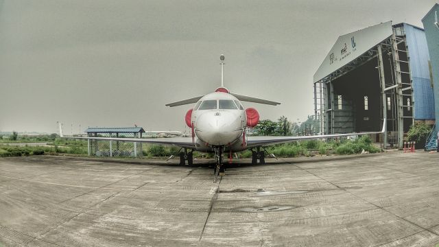 Dassault Falcon 7X (M-SCOT) - Parked in front of Arirang Hangar Complex 